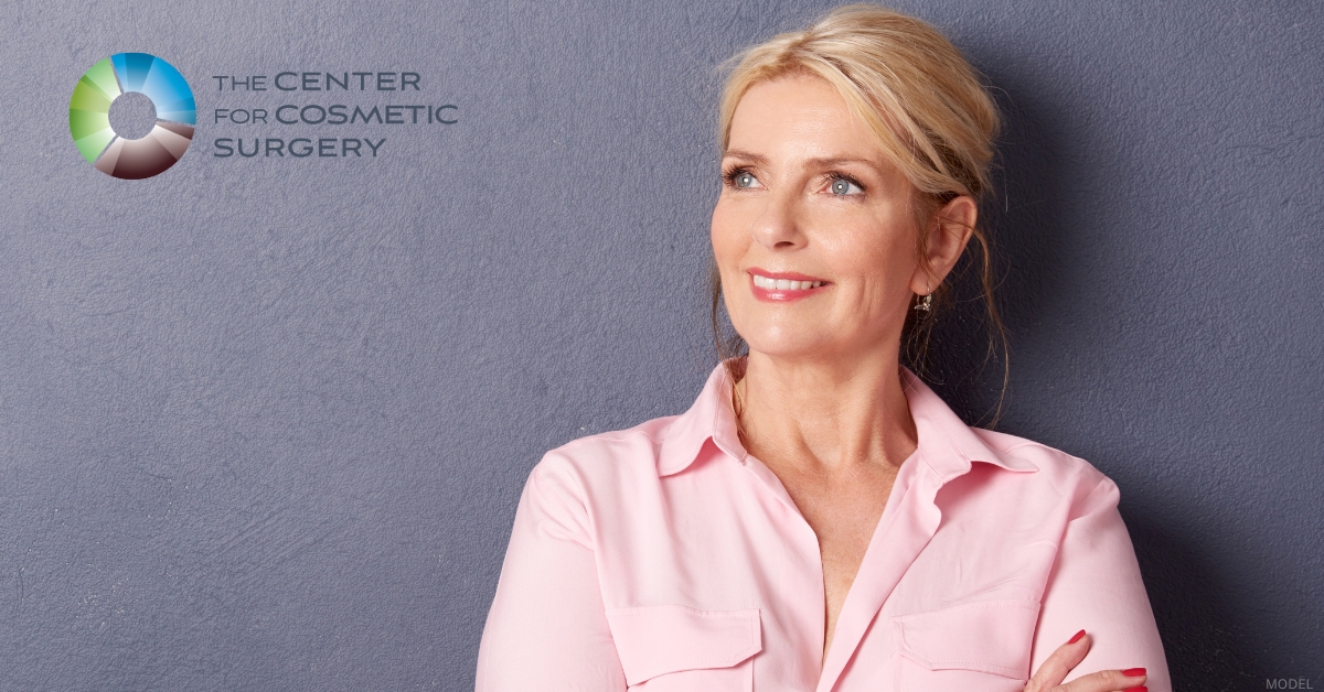 Smiling model representing post-facelift facial rejuvenation. (model)