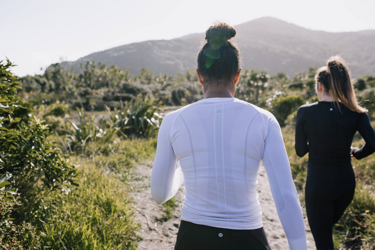 Two Women Running on Trail