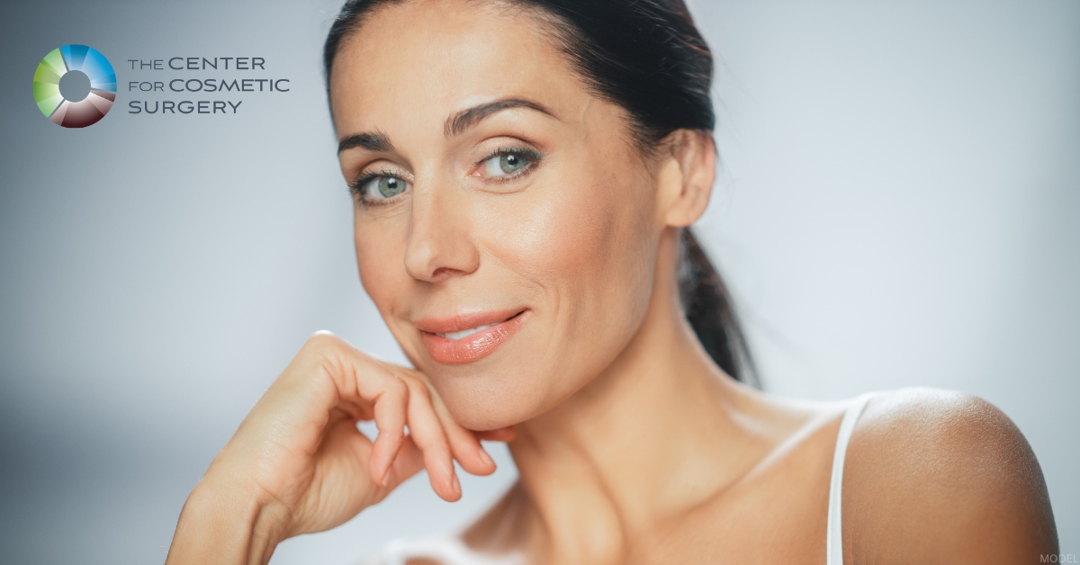 Woman smiles after facelift (model)